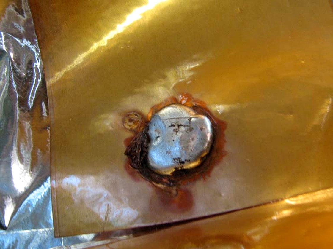 Burning at the tap layer interface